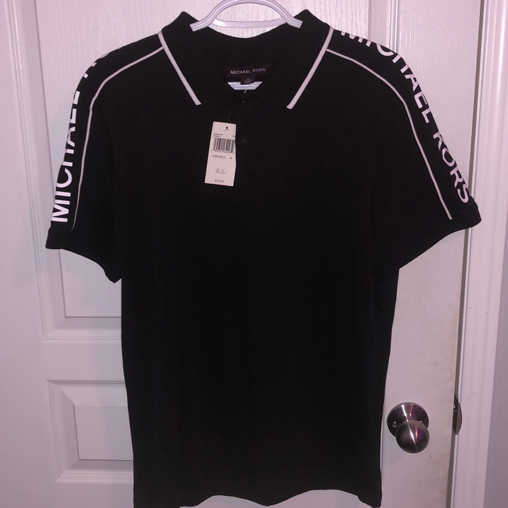 Brand new Michael Kors shirt purchased but didn’t fit me good
